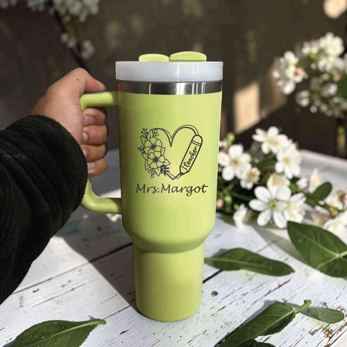Stanley 40oz tumbler with personalized engraving, insulated stainless steel cup with handle and straw, perfect teacher.